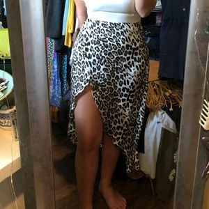 White black brown. Leopard print. Faux wrap skirt. Mini lining underneath.